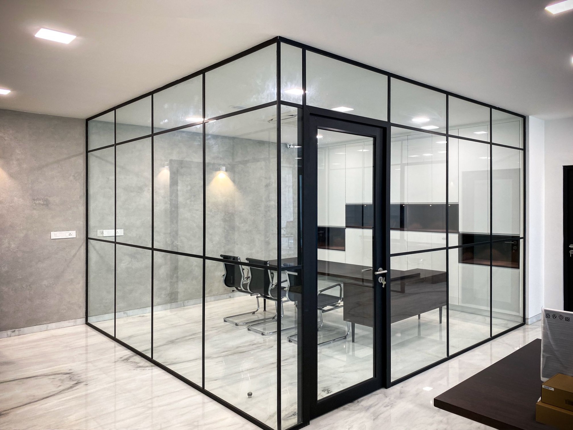 Industrial glass partition in the office.